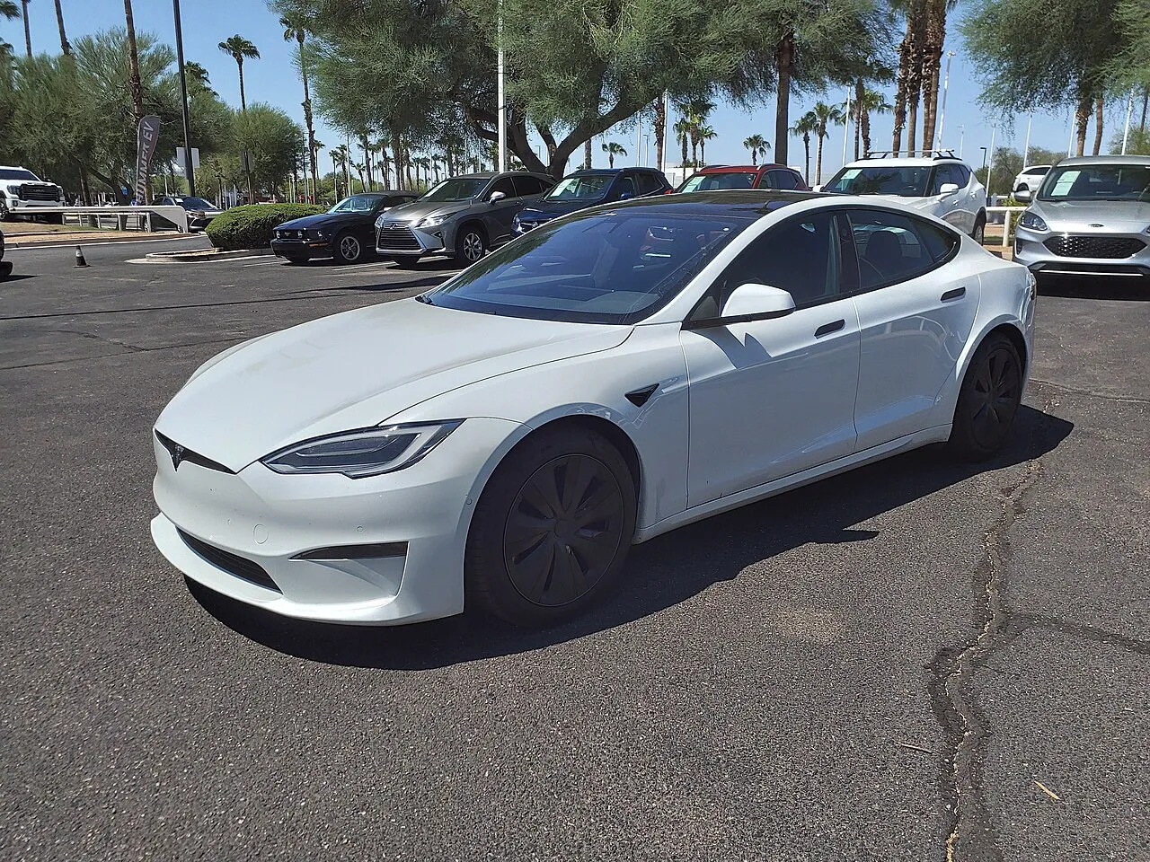 Tesla Model S Plaid model reference photo; not the listed vehicle